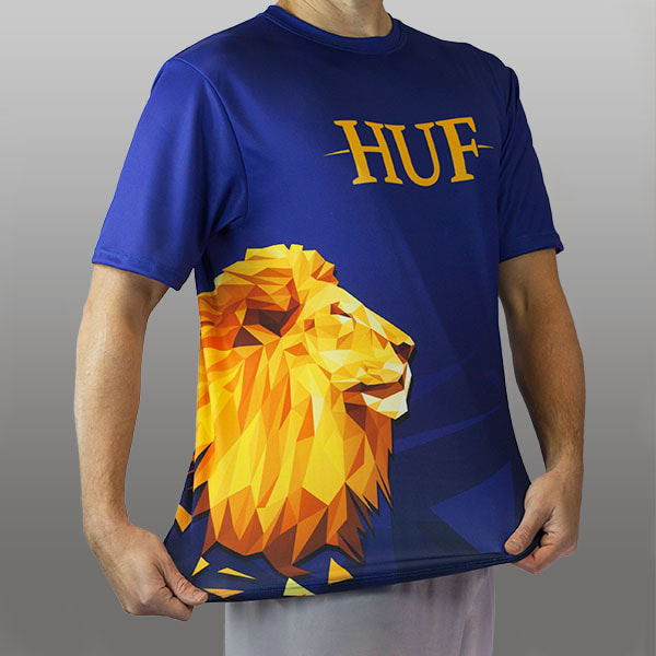 torso of man wearing a blue seamless jersey with golden lion