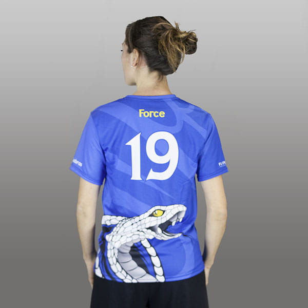 back of woman wearing a blue sublimated jersey