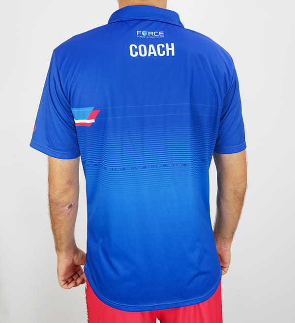 back of man wearing a blue france ultimate polo shirt