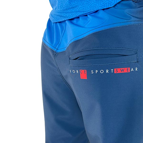 close-up view of the back pocket of a  blue sublimated sports trousers