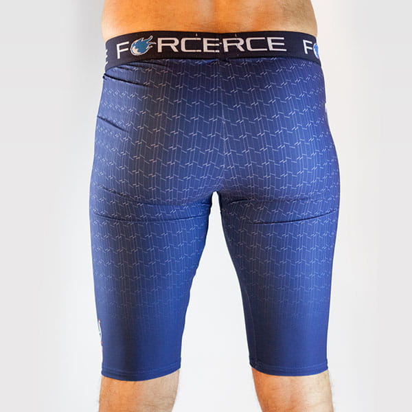 rear view of legs of man wearing blue tights with force belt