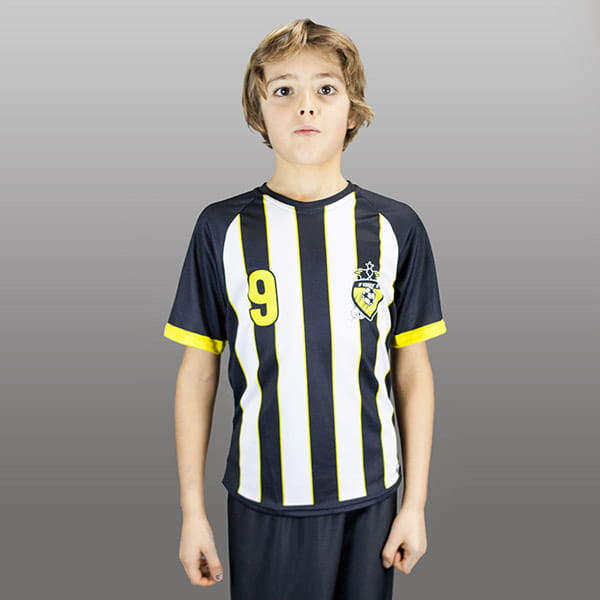 kid wearing a striped black and white raglan jersey