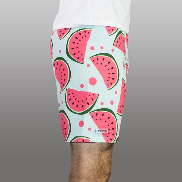side view of man legs wearing watermelon shorts