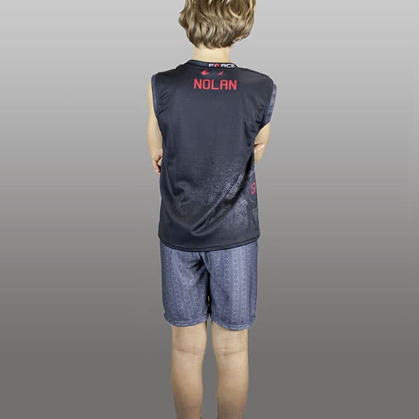back of kid wearing grey shorts and black singlet