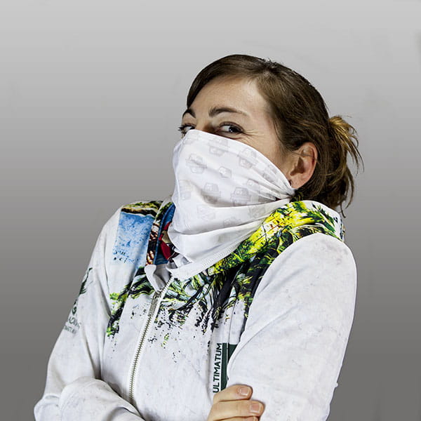 woman hiding her face with a white bandana