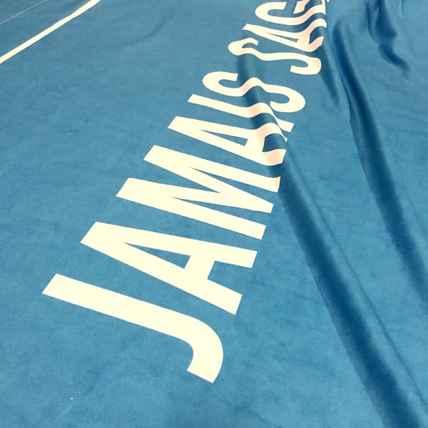 detail of blue printed sublimated beach towel
