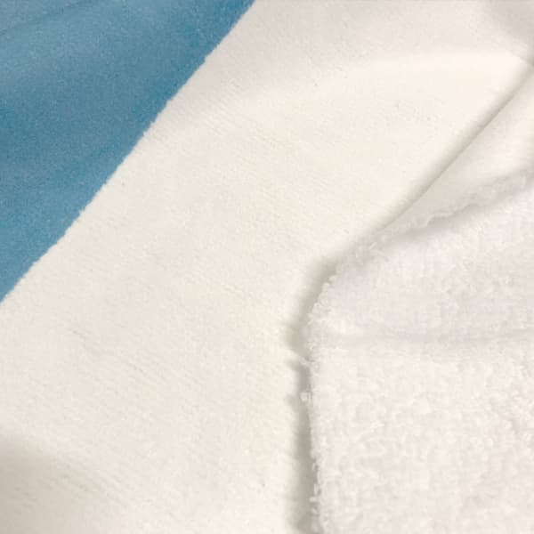 detail of white fabric beach towel